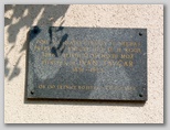 Spominska plošča na Tavčarjevi rojstni hiši v Poljanah